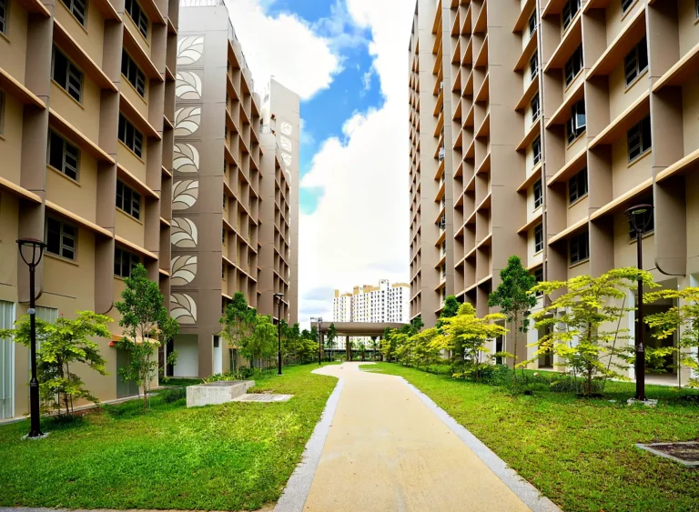 Walkway through open lawn between blocks at Garden Court @ Tengah